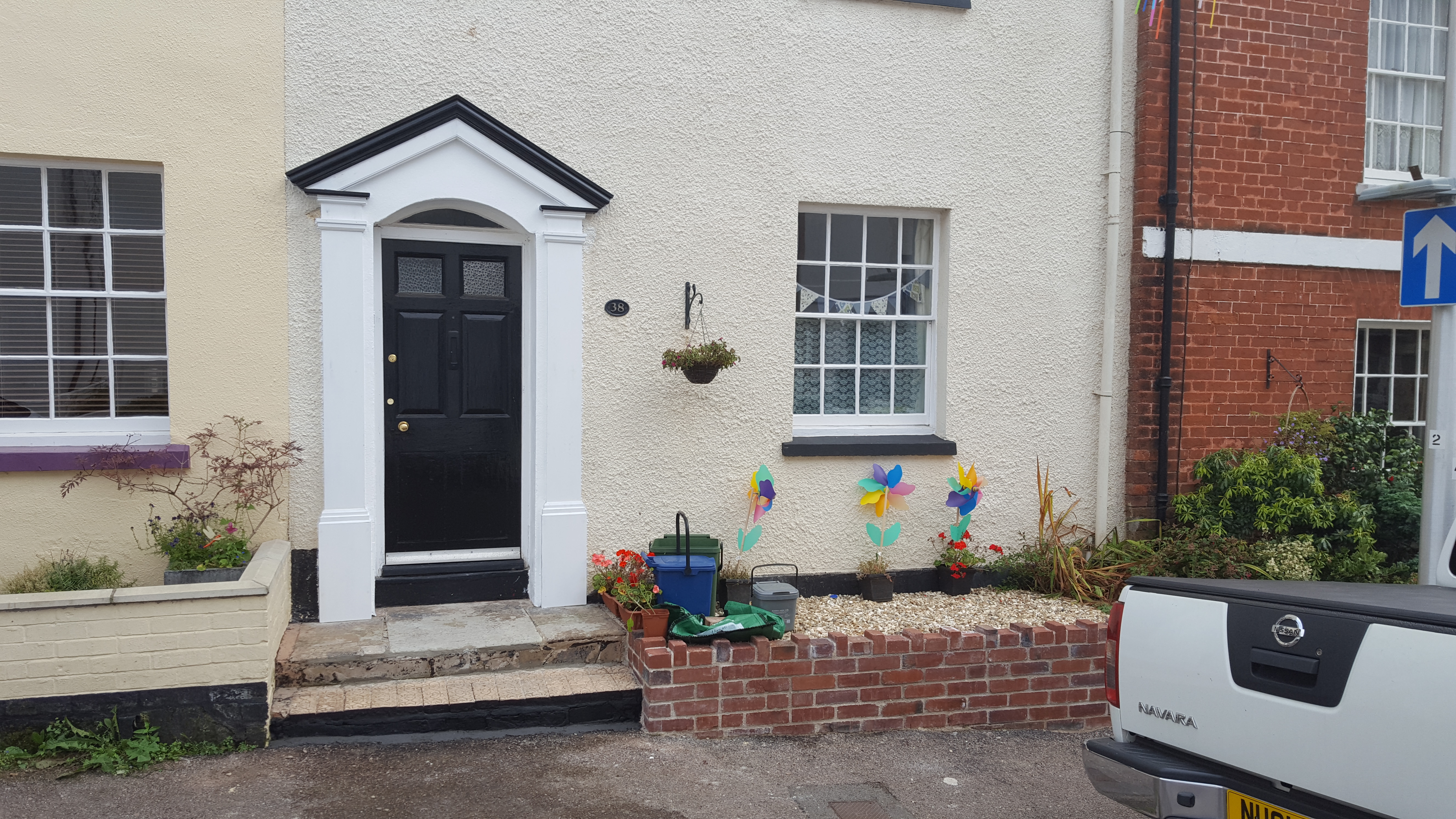 Beautifully restored and repaired historic door surround in an Exeter heritage building, expertly crafted to preserve original details by SBR Property Services Ltd.