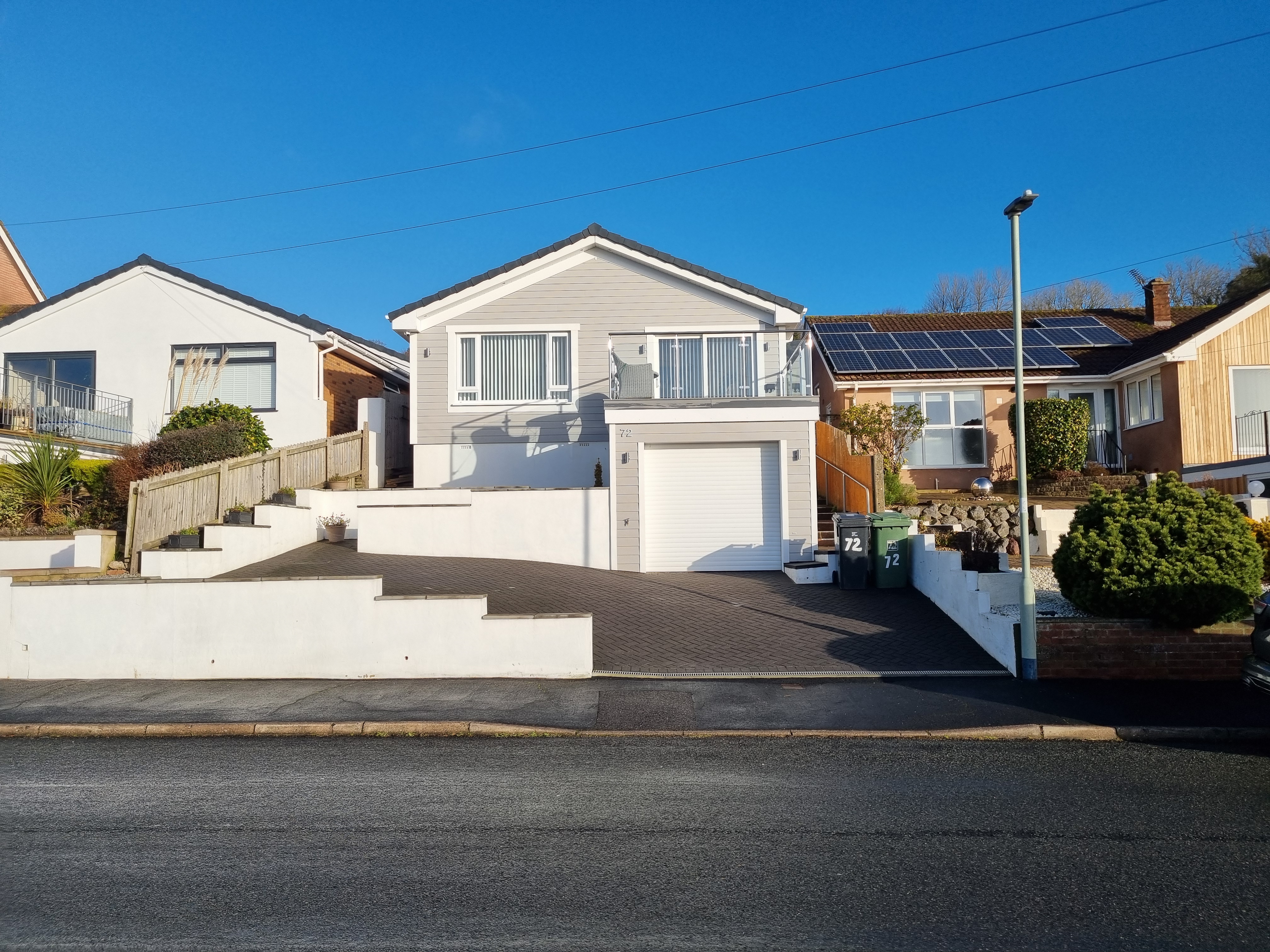 Enhanced home exterior after a facelift by SBR Property Services, highlighting improved curb appeal